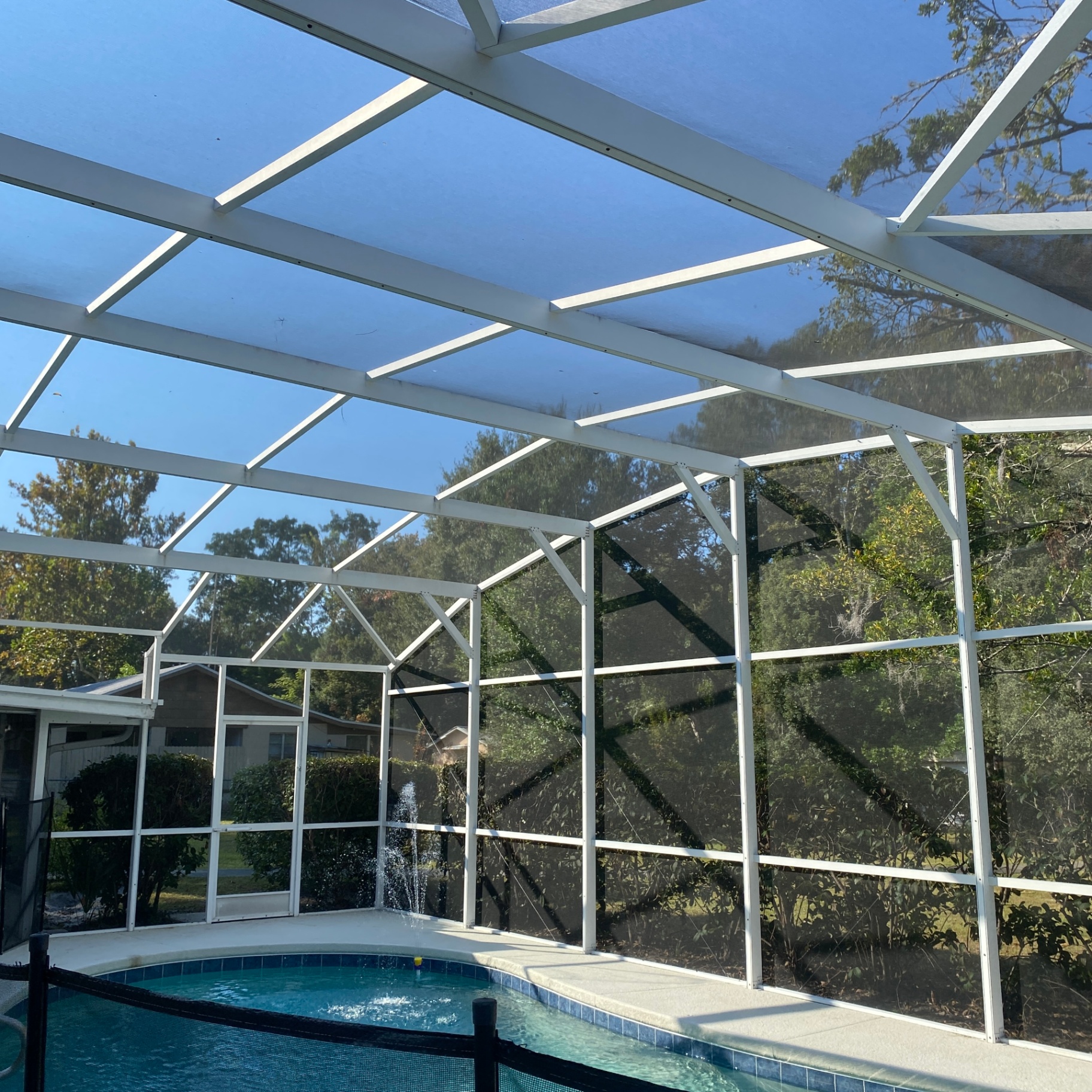 Pool cage glowing at night